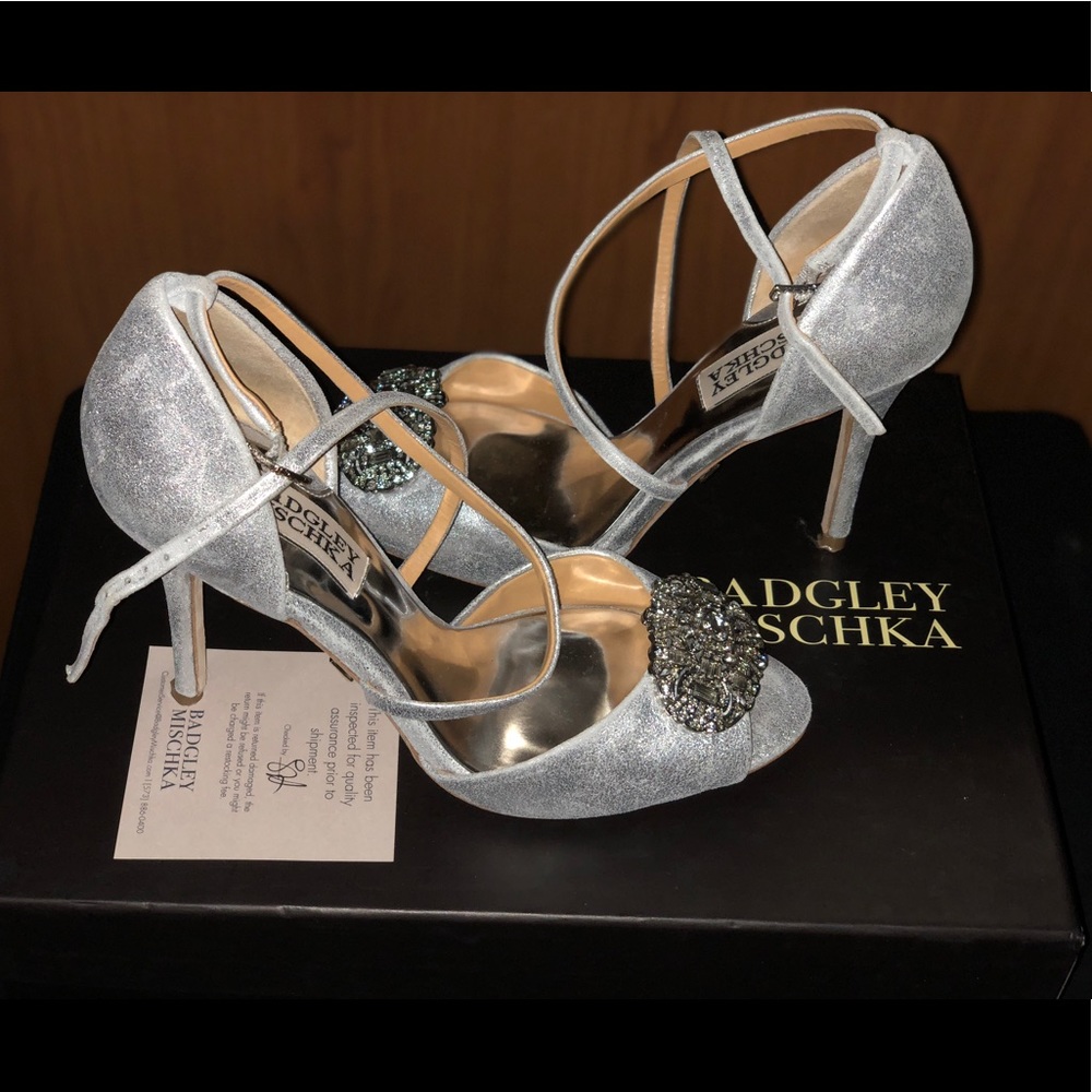 Silver cross strap sandals.